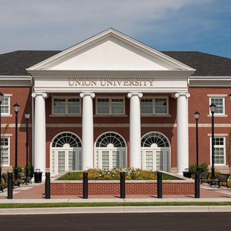 A red-brick building with tall white columns and arched windows labeled "Union University."
