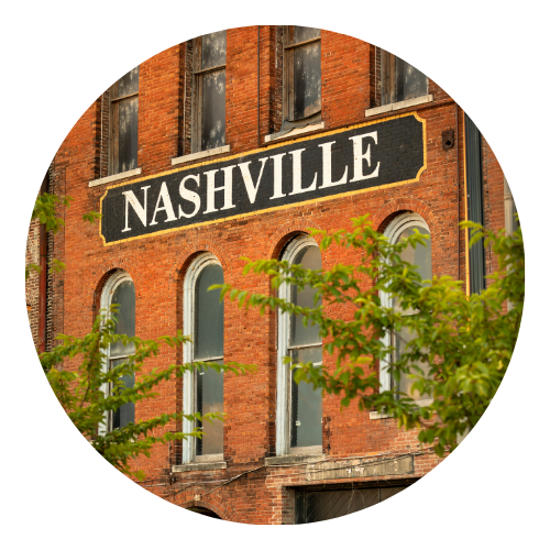 Brick building with a large Nashville sign.
