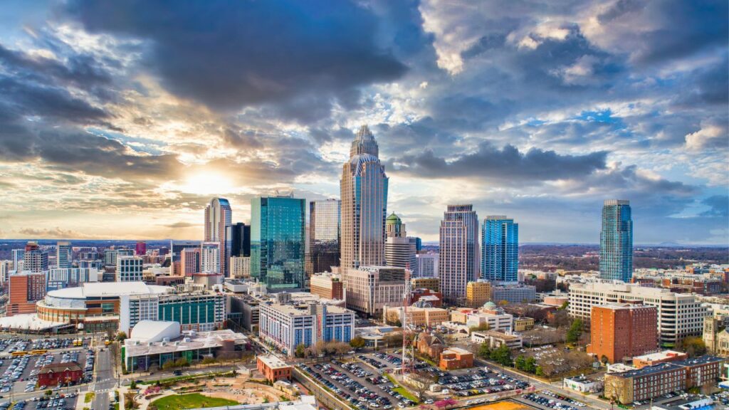Aerial view of Charlotte, NC downtown skyline with tall buildings.
