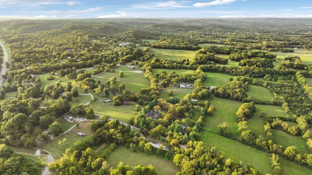 Aerial view of rolling countryside and large residential lots in Franklin, Tennessee.
